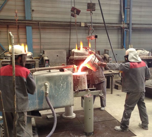 Centrifugal casting process at Tecnacem Liquid metal is poured during the centrifugal casting process at the Tecnacem foundry, subsidiary of LBI